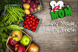 fresh vegetables on farm table with tag and logo